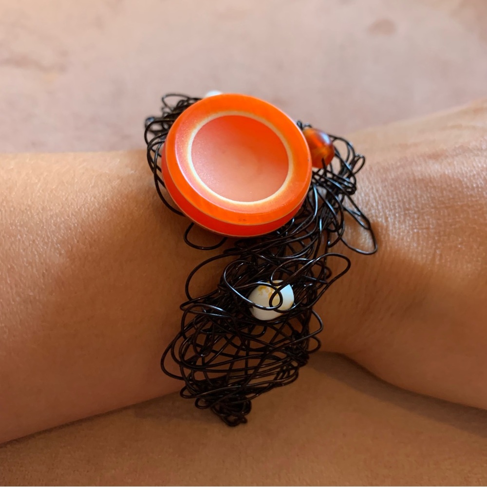 Handmade black twisted wire with orange button and white beads bracelet